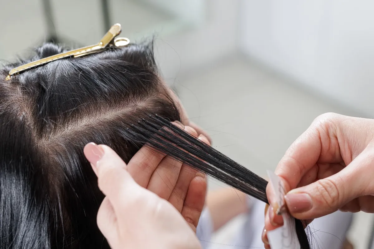 Keratin hair extensions procedure